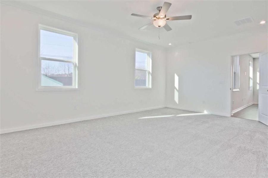 Spacious, unfurnished interior of a new home in The Paddocks at Doc Hughes, Buford (Image 41).