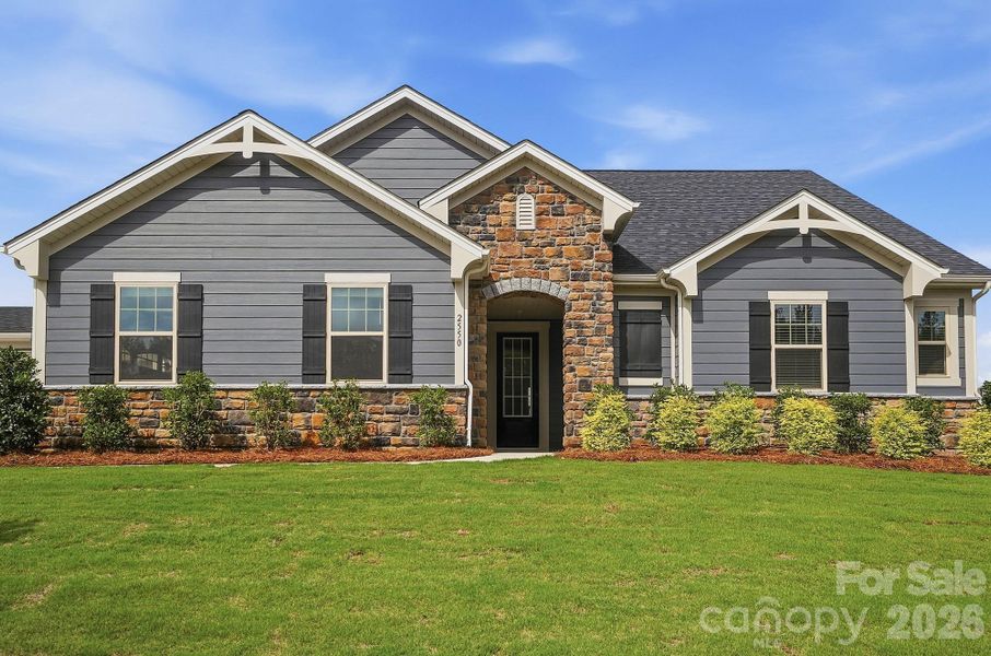 Front exterior of a new home in Blair Place, Monroe, NC, highlighting curb appeal (Image 30).