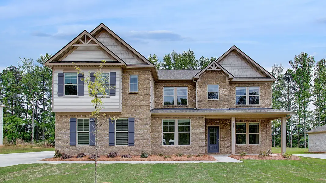 Representative exterior photo of a completed home built from the Rosemary II by DRB Homes in Cambria at Traditions, Hampton, GA (Image 2). Representative exterior photo of a completed home built from the Rosemary II by DRB Homes in Cambria at Traditions, Hampton, GA (Image 2).