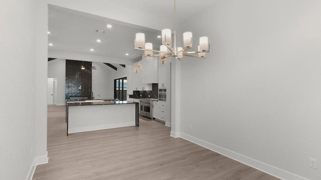 Representative furnished interior of a home built from the Montana by Chesmar Homes in Feathergrass, Florence (Image 11).