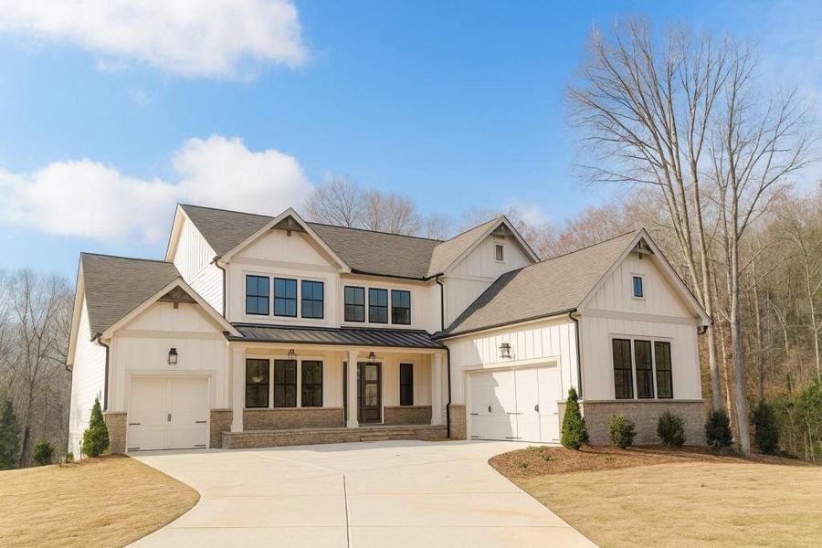 Front exterior of a new home in White Post on Lake Lanier, Gainesville, GA, highlighting curb appeal (Image 1). Front exterior of a new home in White Post on Lake Lanier, Gainesville, GA, highlighting curb appeal (Image 1).