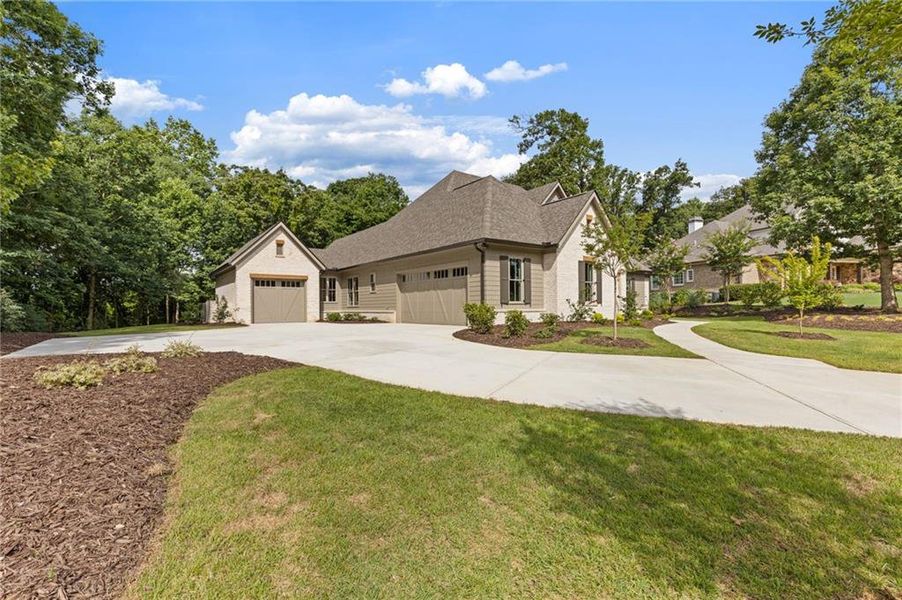 Front exterior of a new home in , Flowery Branch, GA, highlighting curb appeal (Image 28).