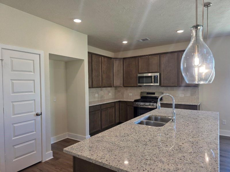 Furnished interior view inside a new home in , Brenham (Image 8).