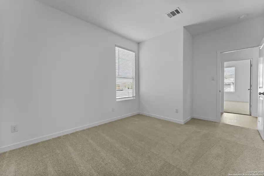 Spacious, unfurnished interior of a new home in Waterwheel: Coastline Collection, San Antonio (Image 7).