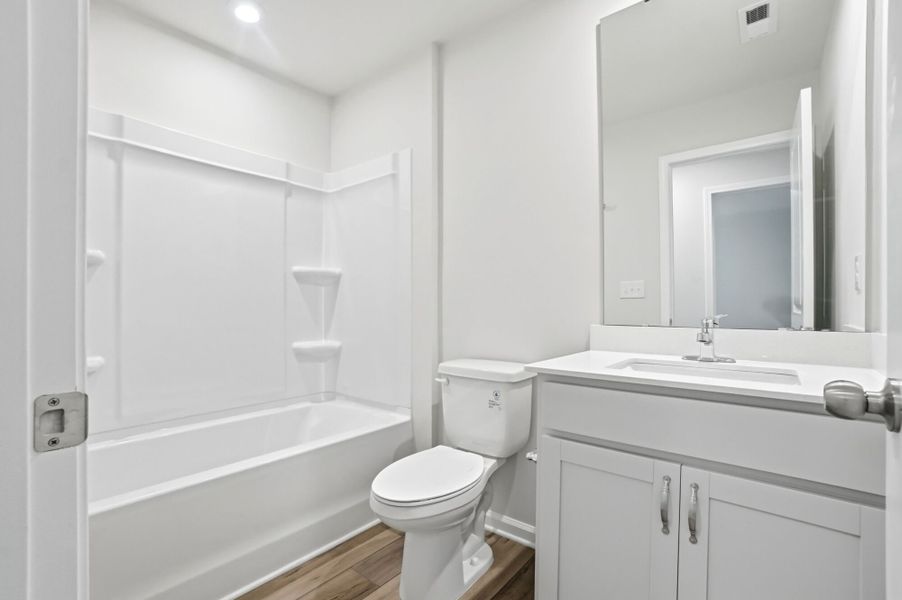 Furnished interior view inside a new home in Stonesummit at Reedy Creek, Charlotte (Image 10).