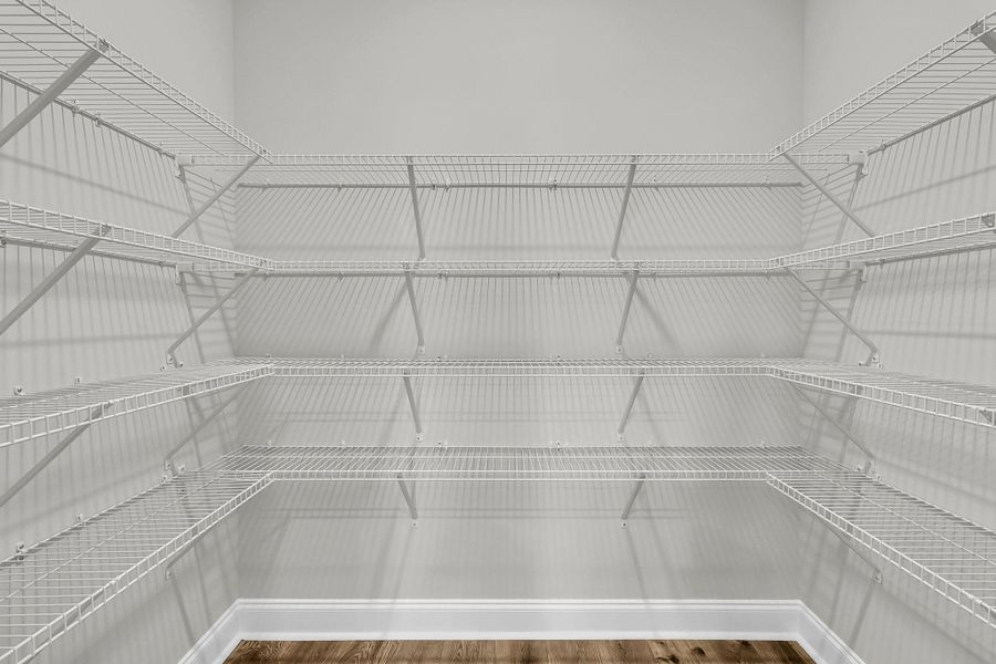 Spacious, unfurnished interior of a new home in Tidewater at Lakes of Cane Bay, Summerville (Image 20).