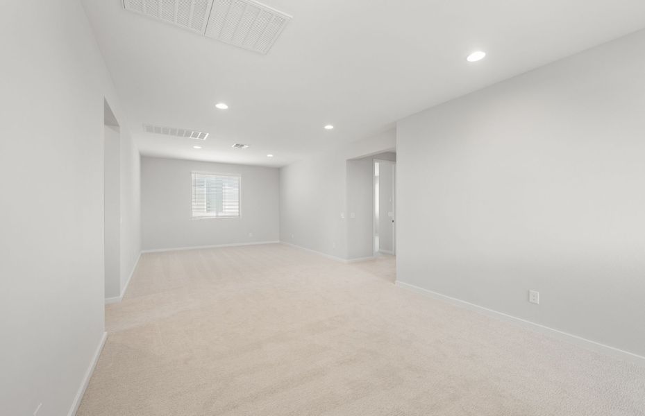 Spacious, unfurnished interior of a new home in Legado West, Queen Creek (Image 33).