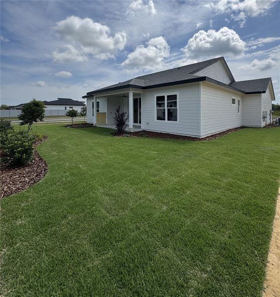 Exterior details and patio area of a home in Laureate Village, Newberry (Image 3).