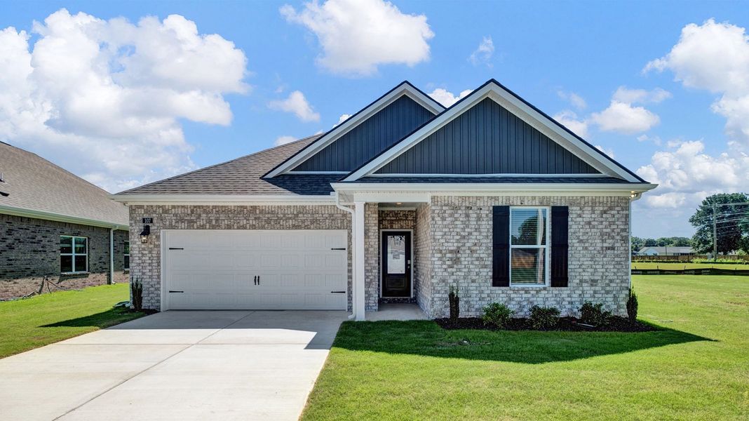 Front exterior of a new home in Shiloh Springs, Jackson, TN, highlighting curb appeal (Image 1). Front exterior of a new home in Shiloh Springs, Jackson, TN, highlighting curb appeal (Image 1).