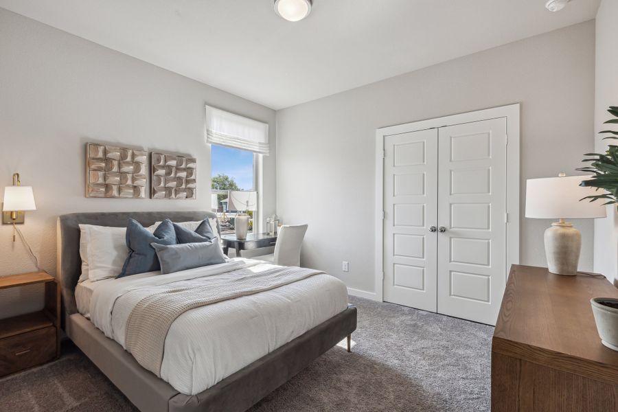 Bedroom in the Wimbledon home plan by Trophy Signature Homes – REPRESENTATIVE PHOTO