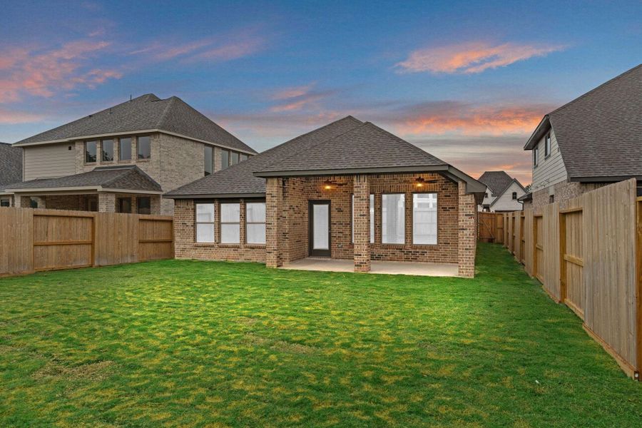 Exterior details and patio area of a home in The Highlands, Porter (Image 23).