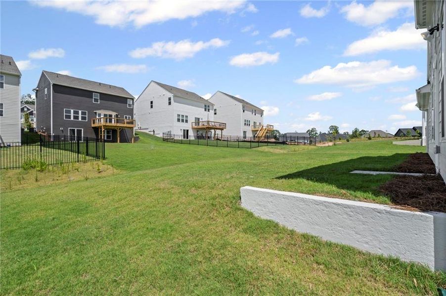 Front exterior of a new home in Twin Lakes, Hoschton, GA, highlighting curb appeal (Image 23).