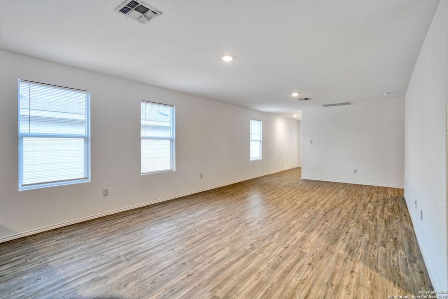 Spacious, unfurnished interior of a new home in Ruby Crossing: Cottage Collection, San Antonio (Image 11).