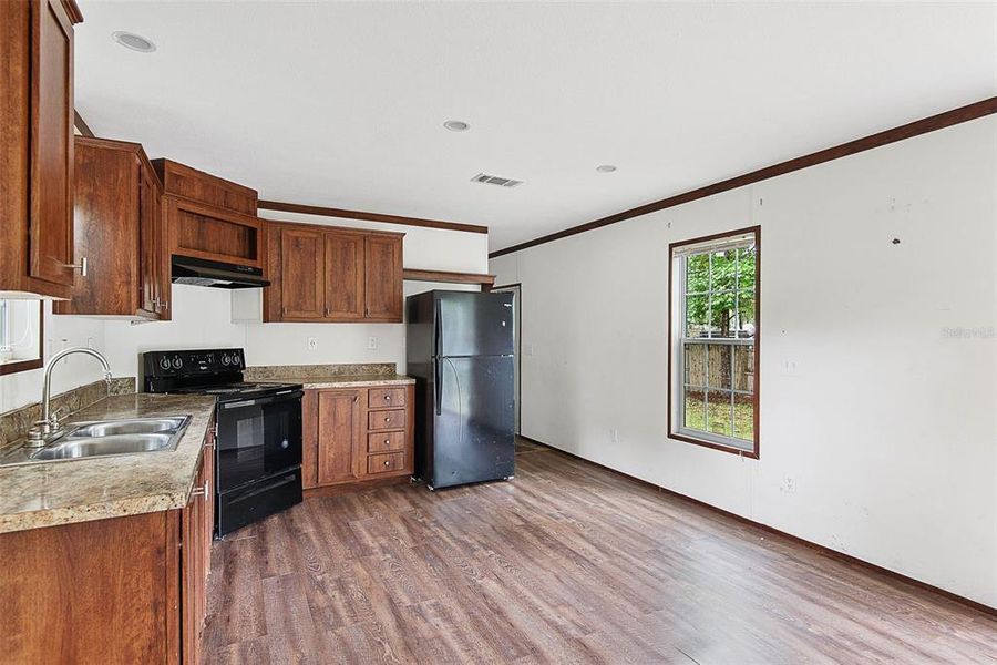 Furnished interior view inside a new home in , Astor (Image 5).