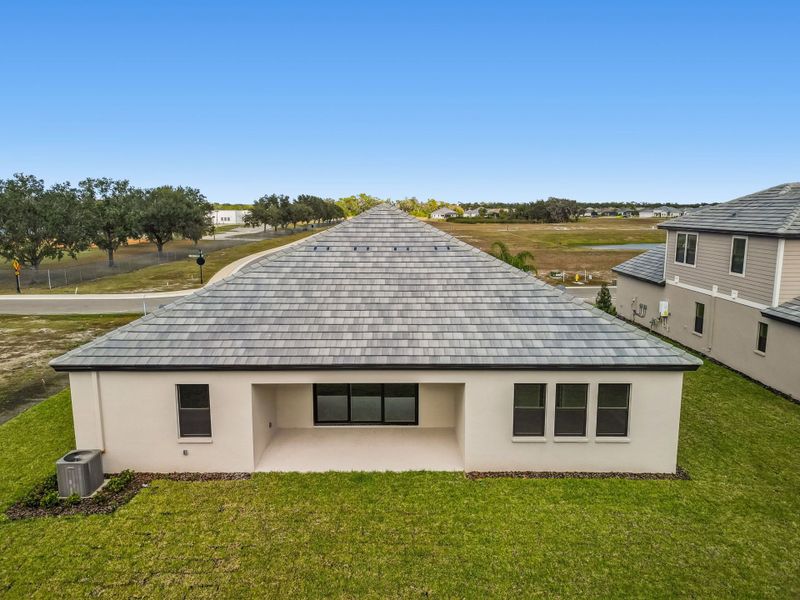 Exterior details and patio area of a home in River Preserve Estates, Parrish (Image 40).