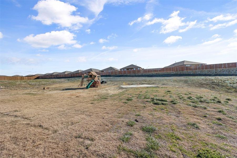 View of yard featuring a playground View of yard featuring a playground