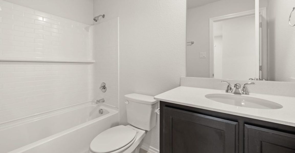 Representative exterior photo of a completed home built from the Brewer by Impression Homes in Redden Farms, Midlothian, TX (Image 19). Representative exterior photo of a completed home built from the Brewer by Impression Homes in Redden Farms, Midlothian, TX (Image 19).