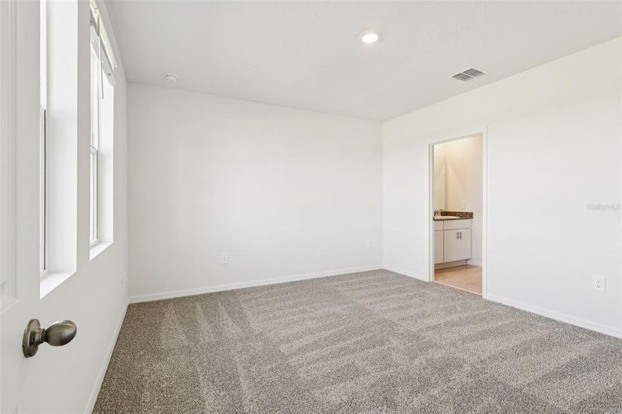 Spacious, unfurnished interior of a new home in Springs at Lake Alfred - Classic Series, Lake Alfred (Image 13).