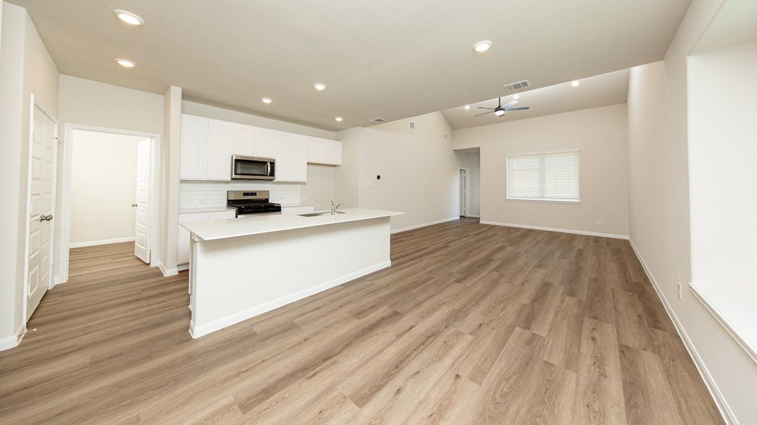 Dining Area and Kitchen to Family Room