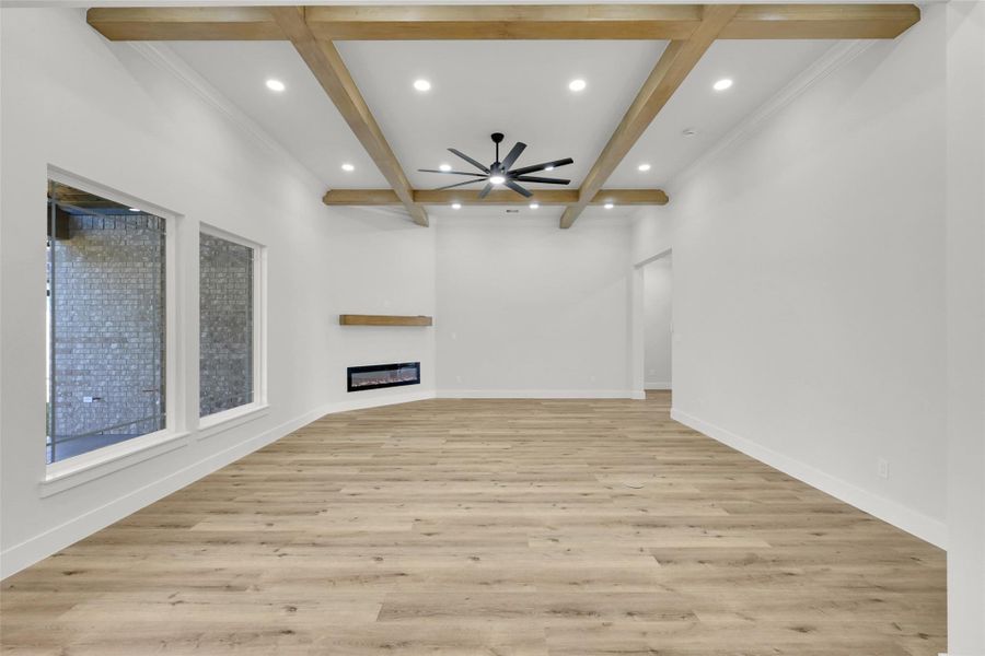 Walls of windows fill the great room with soft natural light Walls of windows fill the great room with soft natural light