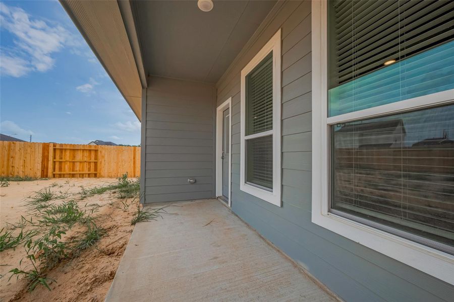 Exterior details and patio area of a home in La Segarra, Brookshire (Image 4).