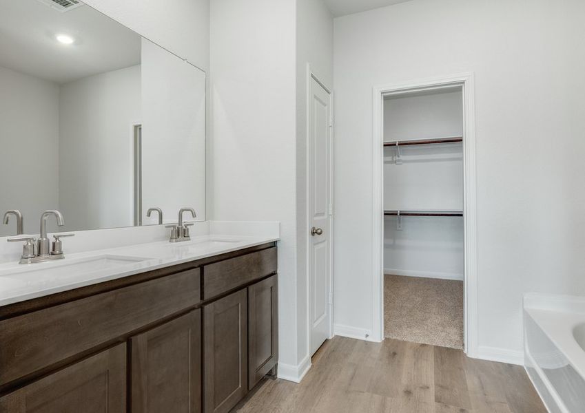 The master bathroom has a nice vanity space.