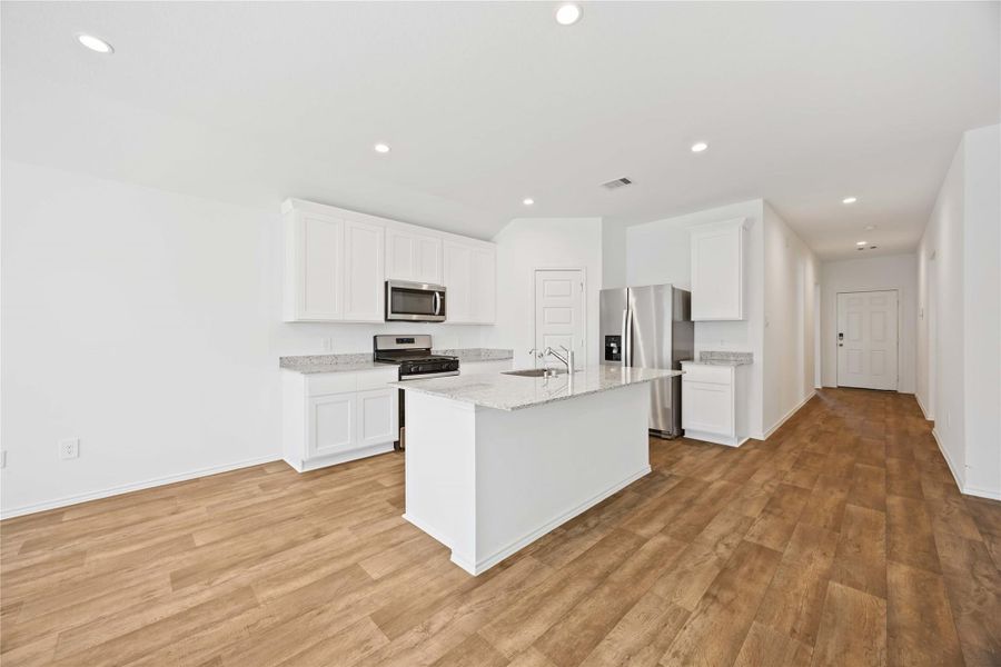 Furnished interior view inside a new home in Tamarron, Fulshear (Image 14).