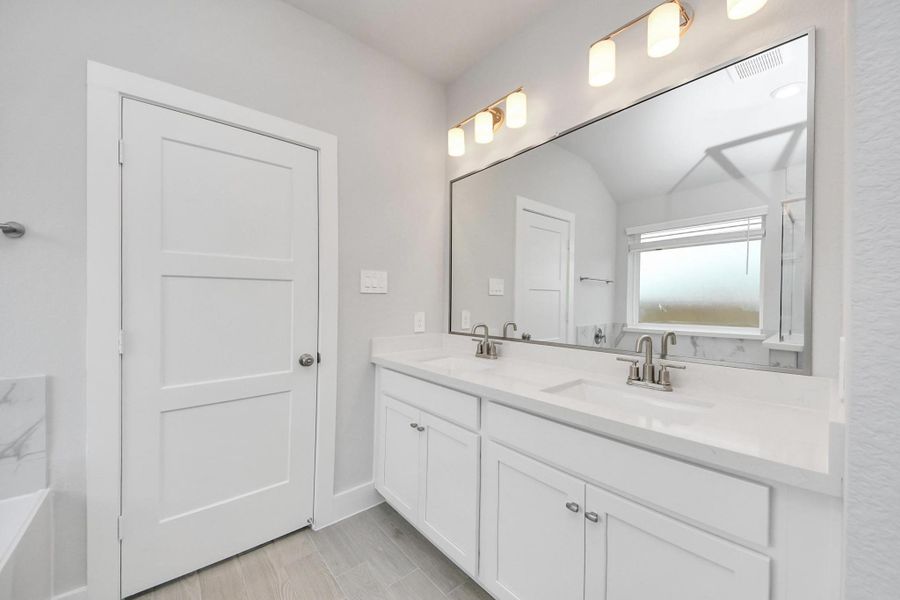 Furnished interior view inside a new home in Laurel Landing: Landmark Collection, Alvin (Image 14).