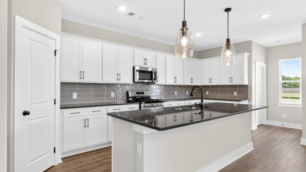 Furnished interior view inside a new home in McClure Farms, Columbia (Image 4). Furnished interior view inside a new home in McClure Farms, Columbia (Image 4).