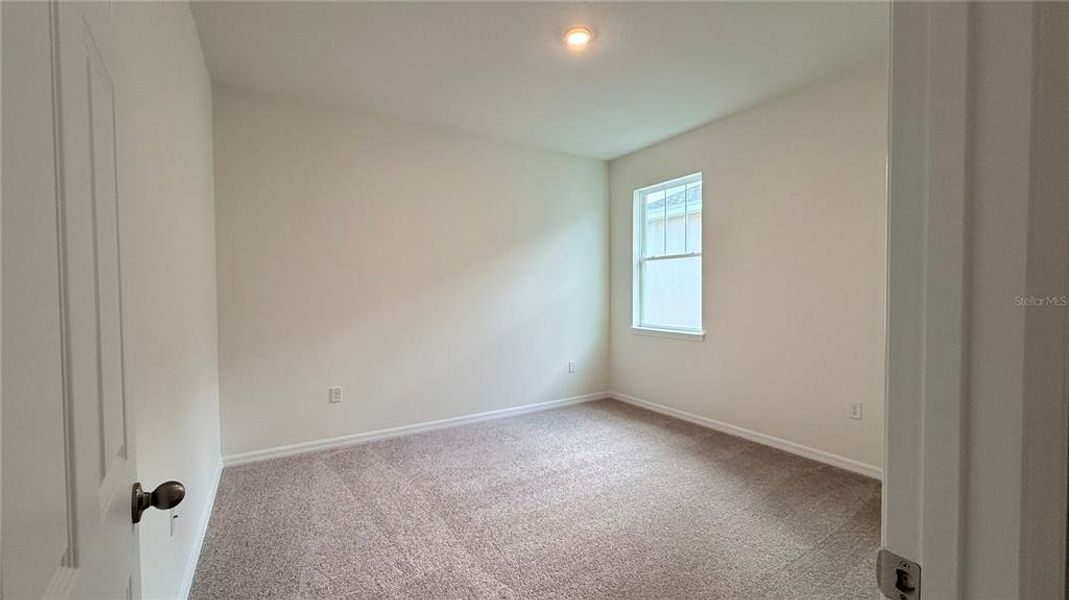 Spacious, unfurnished interior of a new home in Eden Hills, Lake Alfred (Image 3).