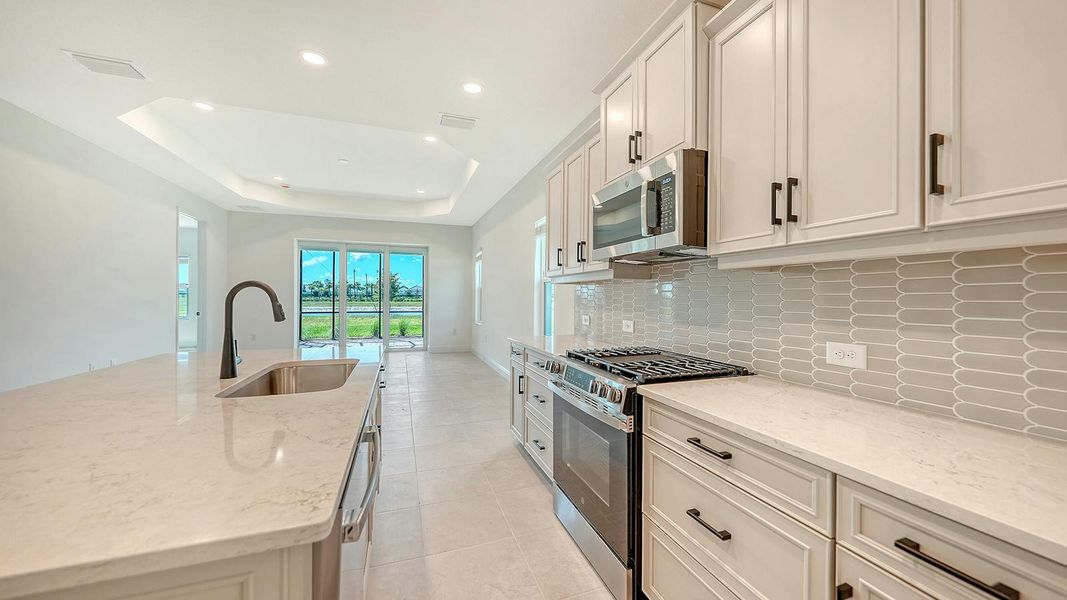 Furnished interior view inside a new home in Palmera Real Estate and Homes for Sale in Venice, FL - Neal Communities, Venice (Image 12). Furnished interior view inside a new home in Palmera Real Estate and Homes for Sale in Venice, FL - Neal Communities, Venice (Image 12).