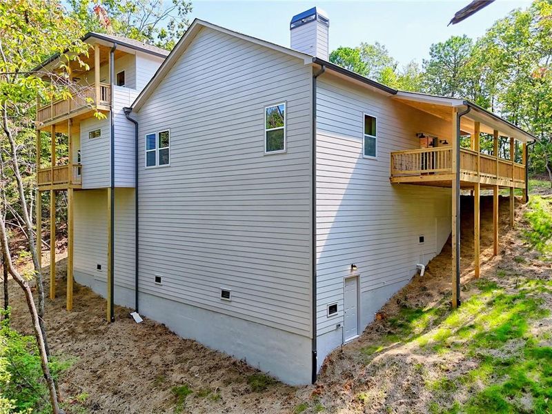 Front exterior of a new home in , Clayton, GA, highlighting curb appeal (Image 38).