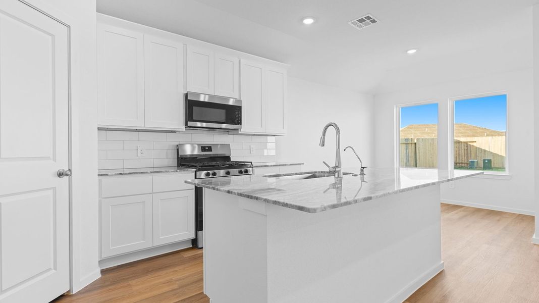 Furnished interior view inside a new home in Watermark, Alvin (Image 3).