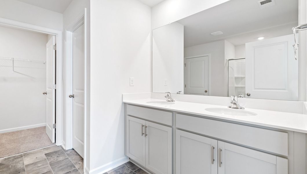 Representative furnished interior of a home built from the AISLE by D.R. Horton in Harrier Point, Woodruff (Image 11).