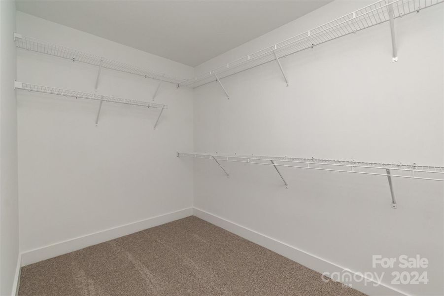 Well Designed Walk-in Closet!