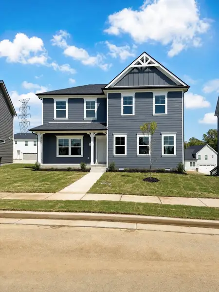Front exterior of a new home in Hobson Park, Antioch, TN, highlighting curb appeal (Image 1). Front exterior of a new home in Hobson Park, Antioch, TN, highlighting curb appeal (Image 1).
