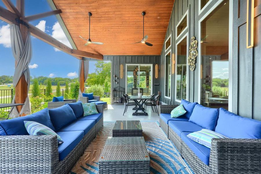 View of patio with outdoor lounge area, outdoor dining space, and ceiling fan View of patio with outdoor lounge area, outdoor dining space, and ceiling fan