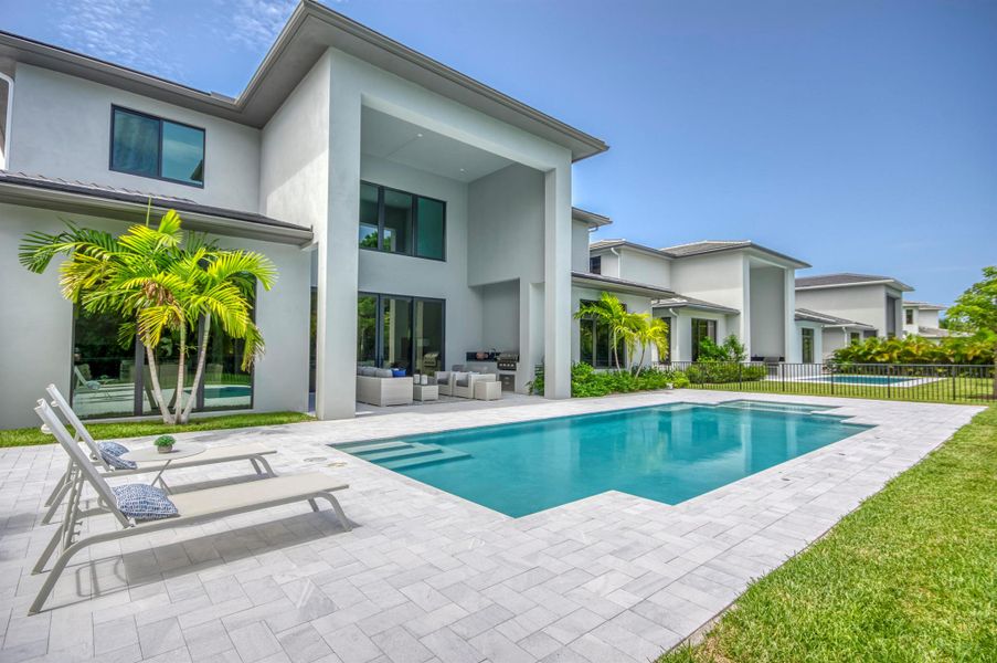 Exterior details and patio area of a home in Symphony at Jupiter, Jupiter (Image 3).