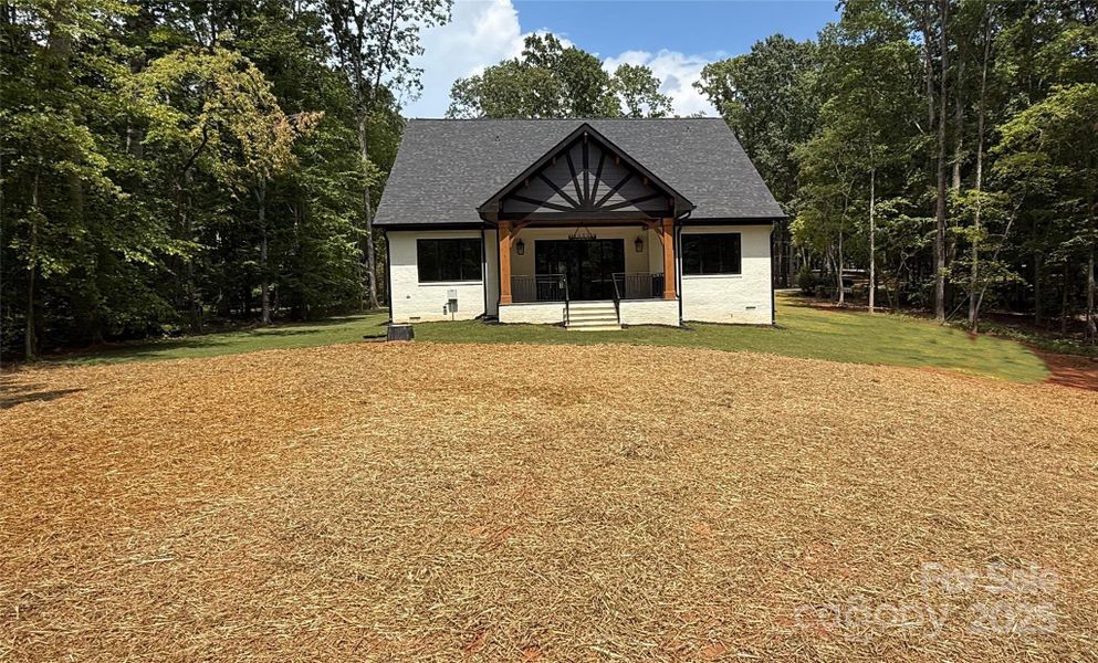 Front exterior of a new home in , Waxhaw, NC, highlighting curb appeal (Image 19).