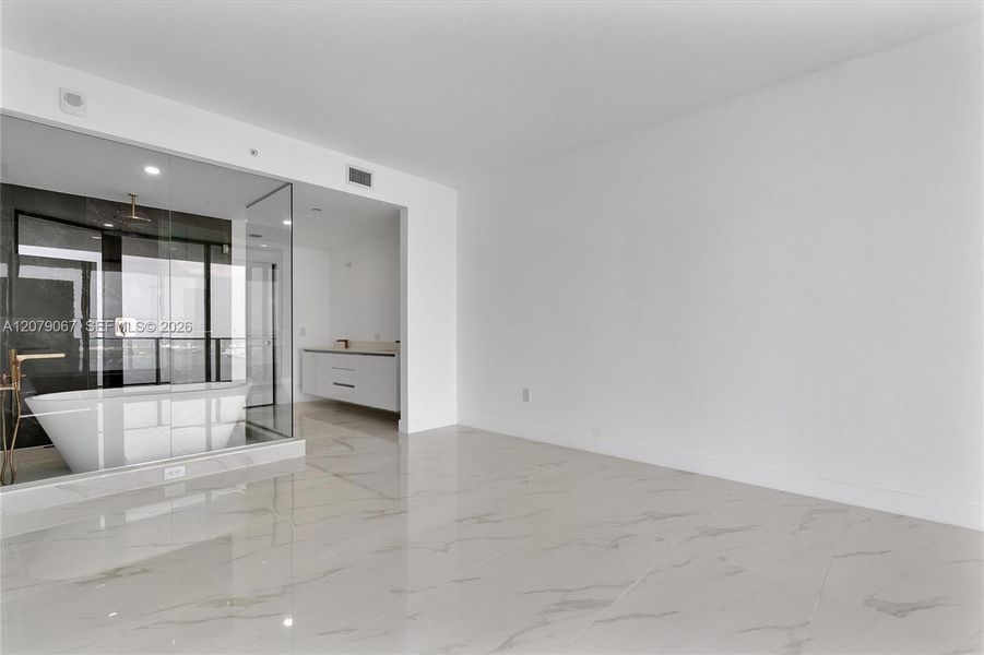 Spacious, unfurnished interior of a new home in Aria Reserve, Miami (Image 7). Spacious, unfurnished interior of a new home in Aria Reserve, Miami (Image 7).