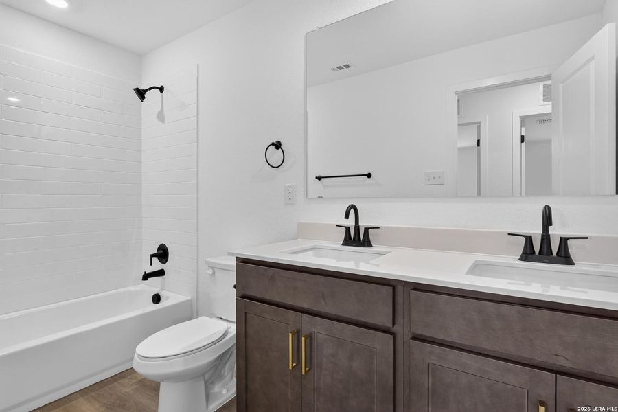 Furnished interior view inside a new home in Cordova Trails, Seguin (Image 12).