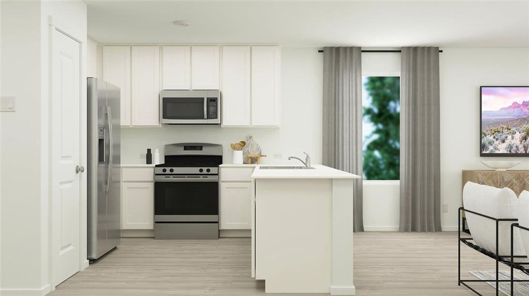 Kitchen with white cabinets, sink, stainless steel appliances, and light hardwood / wood-style flooring