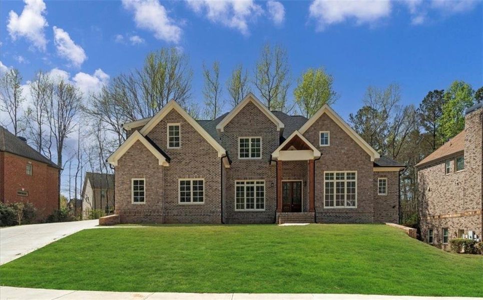 Front exterior of a new home in Brookmont, Douglasville, GA, highlighting curb appeal (Image 25).