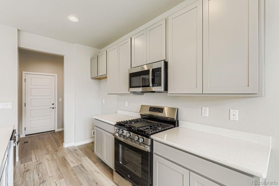 Furnished interior view inside a new home in , Commerce City (Image 11).