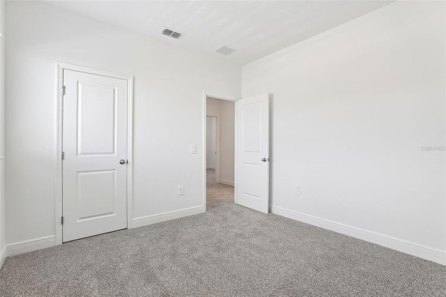 Spacious, unfurnished interior of a new home in Cyrene at Minneola - Villas, Minneola (Image 23).