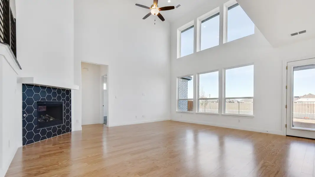 Representative furnished interior of a home built from the Stanford by DRB Homes in Creekhaven, Iowa Colony (Image 7).