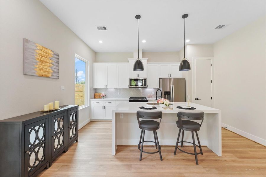 Furnished interior view inside a new home in Blalock Square, Houston (Image 7).