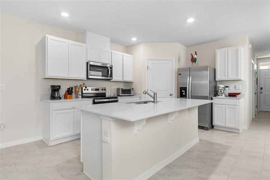 Furnished interior view inside a new home in Lake Deer Estates, Poinciana (Image 7).