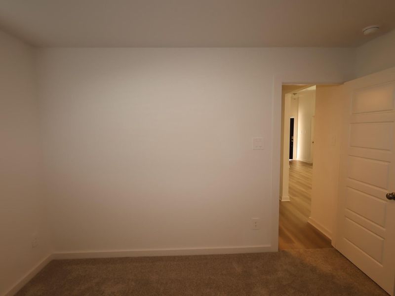 Spacious, unfurnished interior of a new home in Pinewood at Grand Texas, New Caney (Image 21).