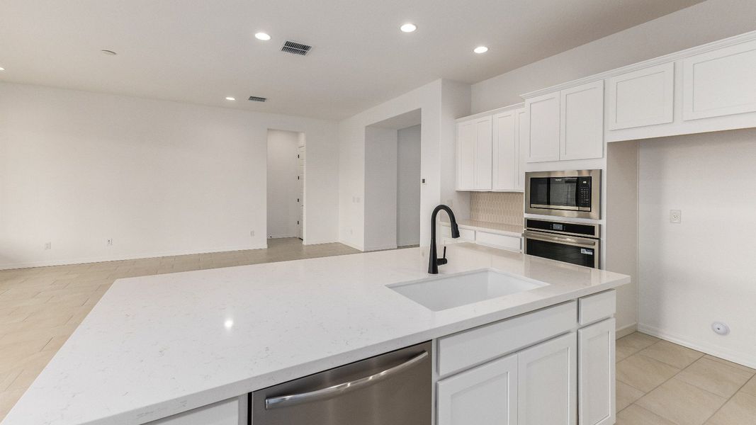 Furnished interior view inside a new home in Arroyo Seco - Hacienda, Buckeye (Image 10).